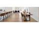 Dining room with hardwood floors and kitchen views at 2630 Angel Falls Dr, Davenport, FL 33837