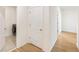 Clean hallway with laundry and linen closets at 2630 Angel Falls Dr, Davenport, FL 33837