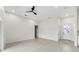 Bright and airy living room with high ceilings and tile flooring at 27 Palmetto Dr, Debary, FL 32713