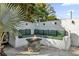Relaxing patio with firepit and built-in seating at 3010 Bay Tree Dr, Orlando, FL 32806
