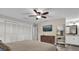 Comfortable bedroom with large closet, dresser, and mounted TV, creating a relaxing and functional space at 3010 Bay Tree Dr, Orlando, FL 32806