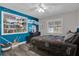 bedroom with built-in shelves and playful decor at 3010 Bay Tree Dr, Orlando, FL 32806