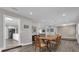 Open concept dining room, kitchen, and living room with hardwood floors at 3010 Bay Tree Dr, Orlando, FL 32806