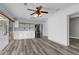 Open kitchen design featuring white cabinets, stainless steel appliances, and sliding glass door to the outside at 3010 Bay Tree Dr, Orlando, FL 32806