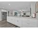 Open concept kitchen featuring a large island with white cabinetry and stainless steel appliances at 3010 Bay Tree Dr, Orlando, FL 32806