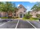 Charming two-story home with a quaint front porch and well-maintained landscaping at 3013 Bonfire Beach Dr # 101, Kissimmee, FL 34746