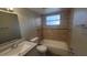 Clean bathroom with tub, shower, and updated vanity at 305 S Candler Ave, Orlando, FL 32835