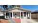 Updated exterior of charming single-story home with new landscaping at 305 S Candler Ave, Orlando, FL 32835