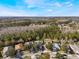 Aerial view of house and surrounding area, highlighting the property's location within a community at 3250 Breakers Way, Orlando, FL 32825