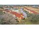Townhome community with a pond and ample parking at 346 Monroe Cir, Davenport, FL 33896