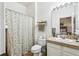 Bathroom with shower/tub combo and updated vanity at 346 Monroe Cir, Davenport, FL 33896