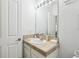 Small bathroom with updated vanity and tile flooring at 346 Monroe Cir, Davenport, FL 33896