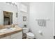Clean bathroom with tile flooring and updated vanity at 346 Monroe Cir, Davenport, FL 33896
