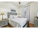 Spacious bedroom with wood floors and neutral decor at 346 Monroe Cir, Davenport, FL 33896