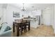 Modern kitchen with stainless steel appliances and white cabinets at 346 Monroe Cir, Davenport, FL 33896