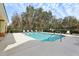 Inviting community pool with lounge chairs for relaxation at 346 Monroe Cir, Davenport, FL 33896