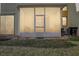 Private screened porch with access to backyard at 346 Monroe Cir, Davenport, FL 33896