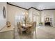 Elegant dining room with chandelier and hardwood floors at 35603 Seneca Reserve Dr, Eustis, FL 32736