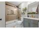 Modern bathroom with a walk-in shower and hexagon tile at 3720 Ryegrass St, Clermont, FL 34714