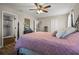 Bedroom with black metal bed frame and purple bedding at 3720 Ryegrass St, Clermont, FL 34714
