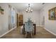 Formal dining room with hardwood floors and a chandelier at 3720 Ryegrass St, Clermont, FL 34714