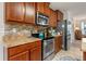 Modern kitchen with granite countertops and stainless steel appliances at 3720 Ryegrass St, Clermont, FL 34714