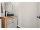 Charming powder room with vessel sink, wood vanity, and mosaic tile at 3720 Ryegrass St, Clermont, FL 34714