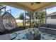 Spacious screened porch with seating area, perfect for relaxing outdoors at 3720 Ryegrass St, Clermont, FL 34714