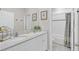 Bathroom with double vanity and a shower/tub combo at 39641 Royal Trails Rd, Eustis, FL 32736