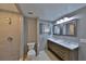 Bathroom features double vanity, large mirror, and shower at 4135 Chuluota Rd, Orlando, FL 32820
