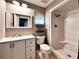 Clean bathroom with a shower, toilet, and vanity at 4135 Chuluota Rd, Orlando, FL 32820