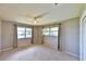 Bright bedroom with neutral walls and carpeting at 4135 Chuluota Rd, Orlando, FL 32820