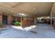 Covered carport with brick accents and lush landscaping at 4135 Chuluota Rd, Orlando, FL 32820