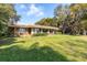 Ranch-style home with large yard and mature trees at 4135 Chuluota Rd, Orlando, FL 32820