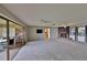 Bright living room featuring a fireplace and access to a sunroom at 4135 Chuluota Rd, Orlando, FL 32820