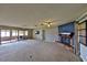 Spacious living room with fireplace and sliding doors at 4135 Chuluota Rd, Orlando, FL 32820