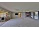 Spacious living room with fireplace and view to patio at 4135 Chuluota Rd, Orlando, FL 32820
