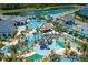 Aerial view of resort-style pool with lazy river, playground, and clubhouse at 4152 Paragraph Dr, Kissimmee, FL 34746