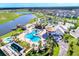 Community with resort-style pool and lake at 4152 Paragraph Dr, Kissimmee, FL 34746