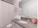 Clean bathroom with gray countertops and princess-themed decor at 4152 Paragraph Dr, Kissimmee, FL 34746