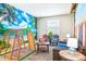 Playroom with climbing wall and beach mural at 4152 Paragraph Dr, Kissimmee, FL 34746