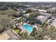 Community pool and surrounding building view from above at 4876 Conway Rd # 96, Orlando, FL 32812