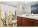 Clean bathroom with updated vanity and shower at 4876 Conway Rd # 96, Orlando, FL 32812