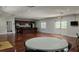 Community room with kitchen and tables at 4876 Conway Rd # 96, Orlando, FL 32812
