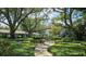 Community courtyard with fountain and landscaping at 4876 Conway Rd # 96, Orlando, FL 32812