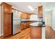 Modern kitchen with stainless steel appliances and dark countertops at 4876 Conway Rd # 96, Orlando, FL 32812