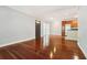 Bright living room with hardwood floors and large windows at 4876 Conway Rd # 96, Orlando, FL 32812