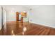 Bright living room with hardwood floors and a kitchen view at 4876 Conway Rd # 96, Orlando, FL 32812