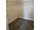 Walk-in closet featuring new carpeting and wire shelving at 520 Orient Ave, Debary, FL 32713