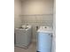 Functional laundry room equipped with new washer and dryer at 520 Orient Ave, Debary, FL 32713
